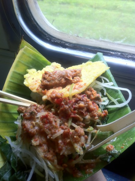 Pecel with tempe mendoan on the train on the way home from Yogya.